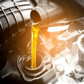 Refueling and pouring oil quality into the engine motor car Transmission and Maintenance Gear .Energy fuel concept., Refueling and pouring oil quality into the engine motor car Tran